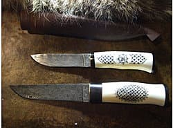 Hand forged damascus steel blades, Ox bone and buffalo horn handles, Nordic style scrimshaw