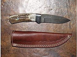 Hunting Knife, Damascus steel blade with steel guard, Stag horn handle